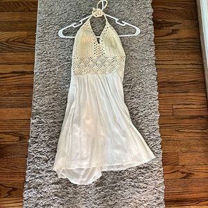 Beautiful beachy dress that has an open back and is in a size small.